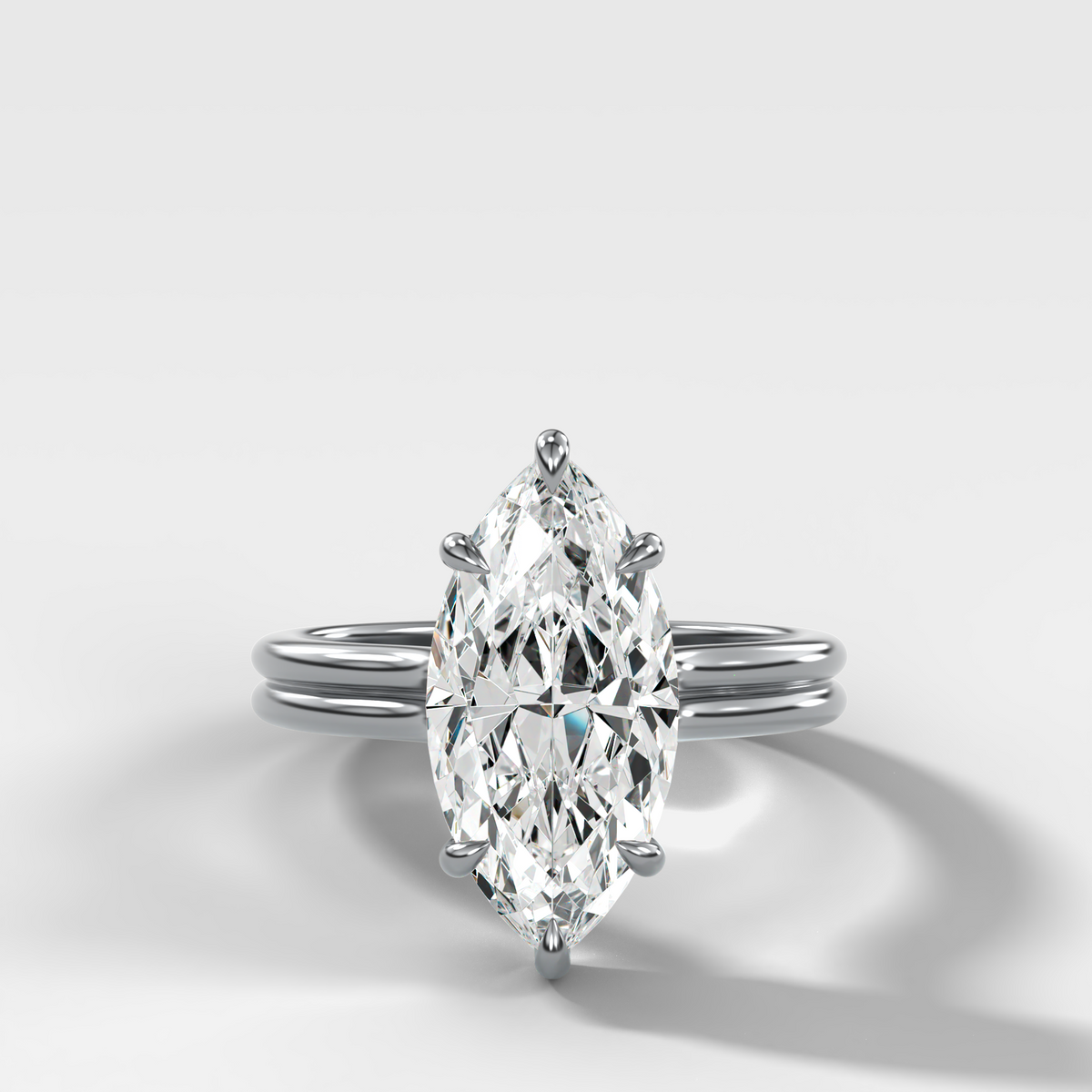 Double Row Solitaire Engagement Ring With Marquise Cut Diamond