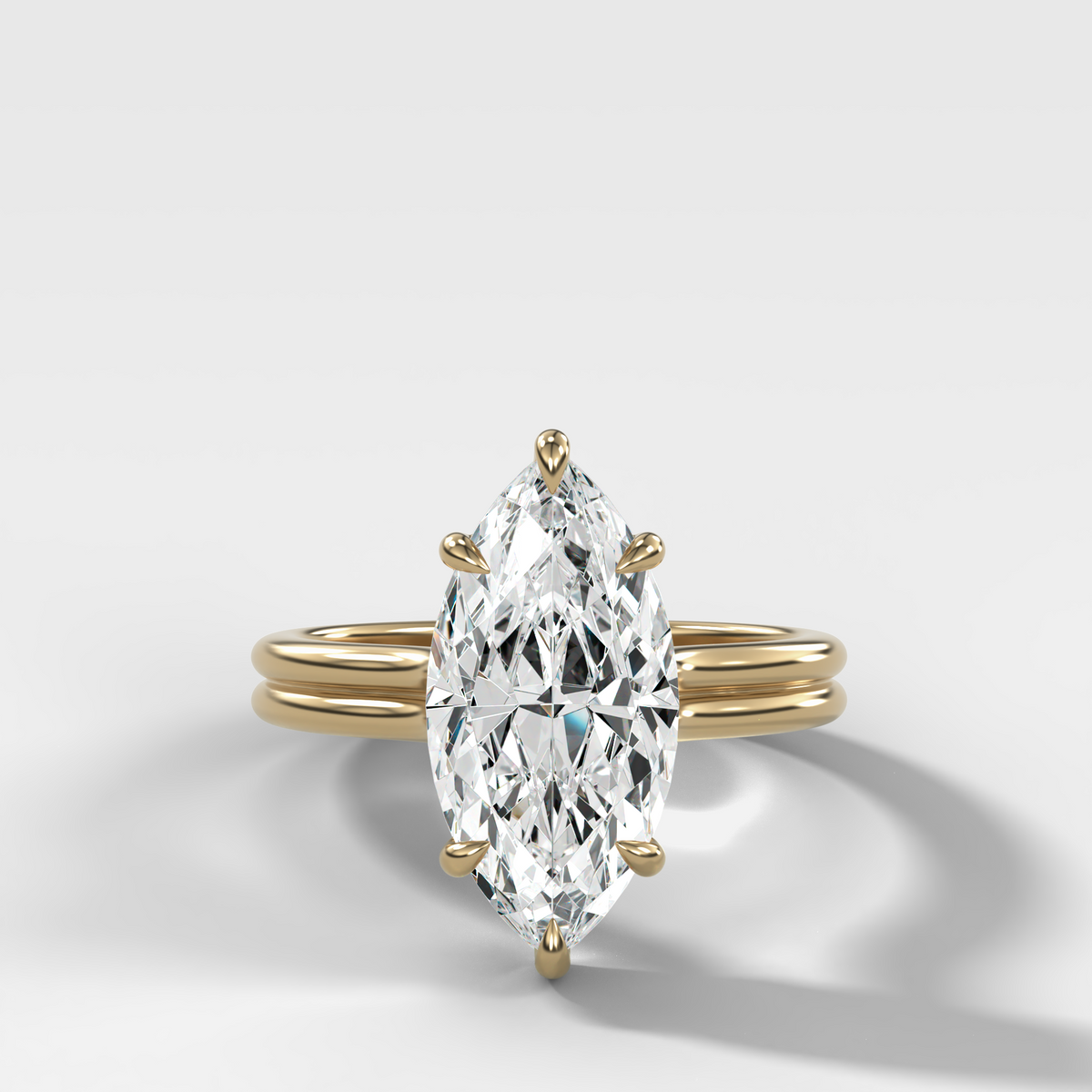 Double Row Solitaire Engagement Ring With Marquise Cut Diamond