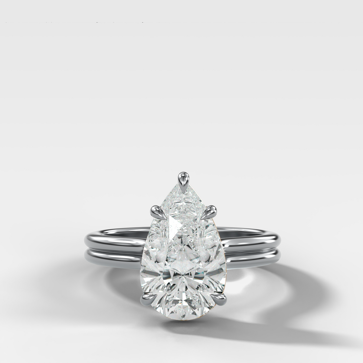 Double Row Solitaire Engagement Ring With Pear Cut Diamond