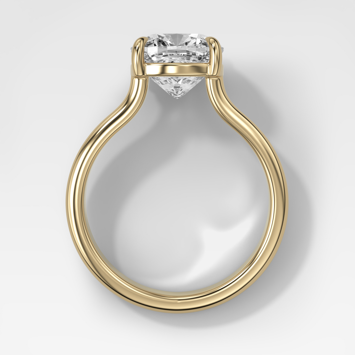Anillo de compromiso con solitario de medio bisel y doble hilera con diamante de talla esmeralda