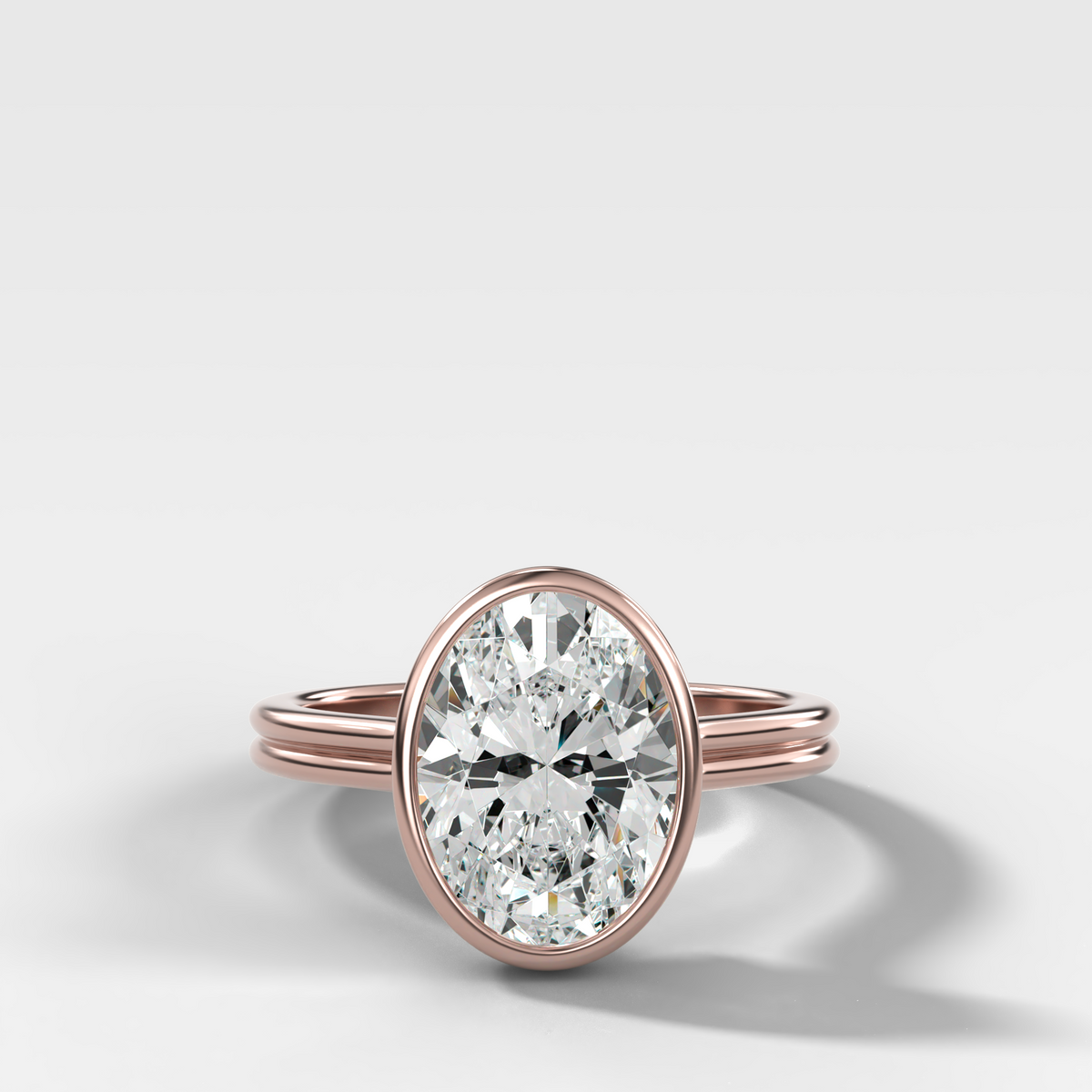 Double Row Penumbra Bezel Engagement Ring With Oval Cut Diamond