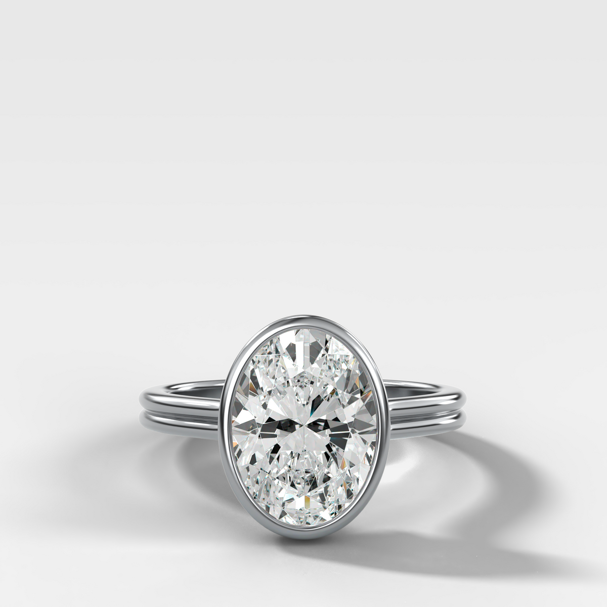 Double Row Penumbra Bezel Engagement Ring With Oval Cut Diamond