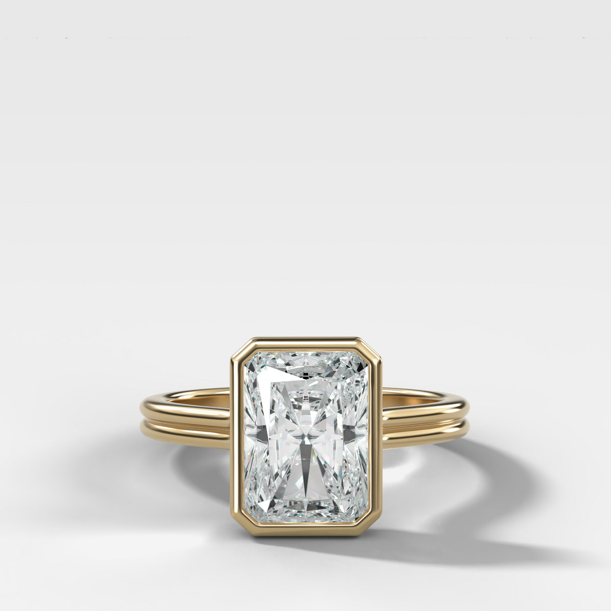 Double Row Penumbra Bezel Engagement Ring With Elongated Radiant Cut Diamond