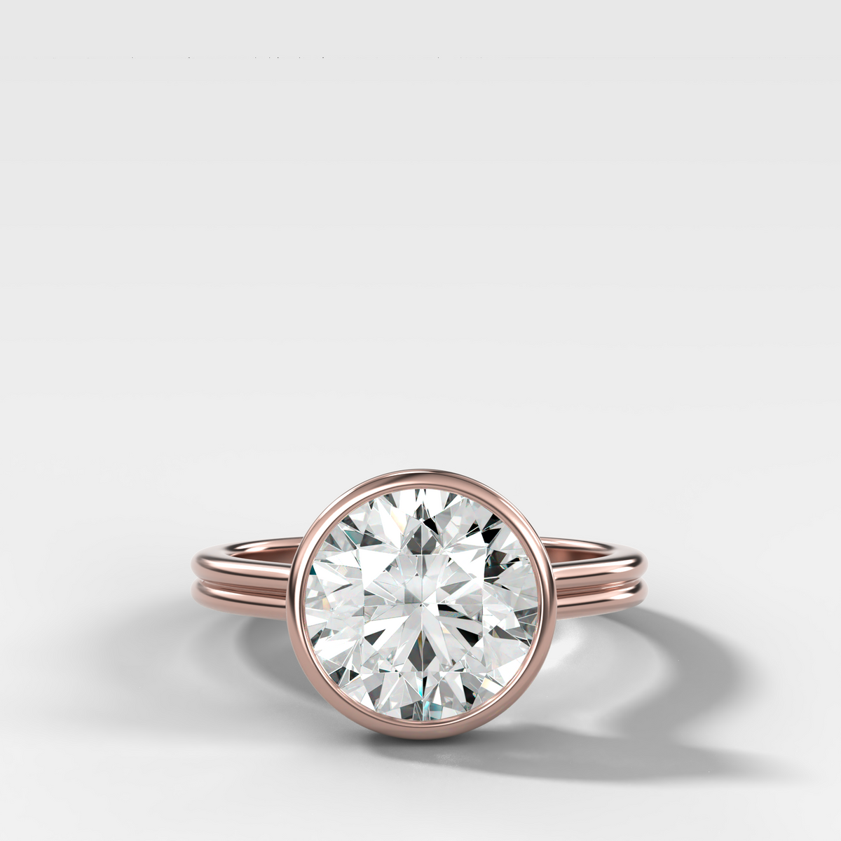 Double Row Penumbra Bezel Engagement Ring With Round Cut Diamond