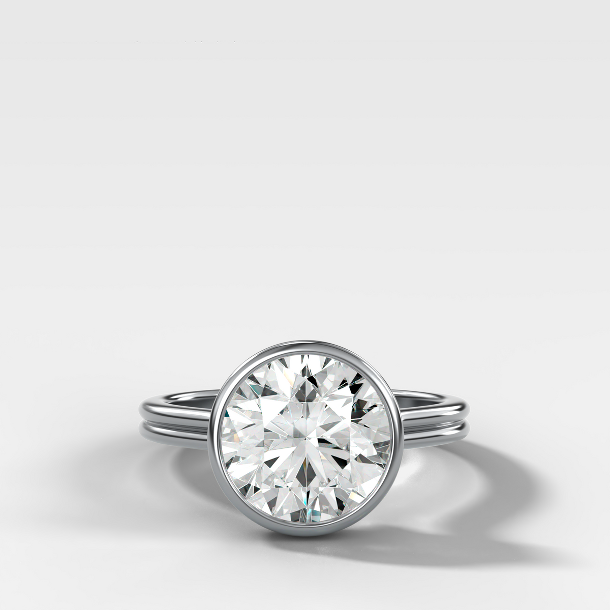 Double Row Penumbra Bezel Engagement Ring With Round Cut Diamond