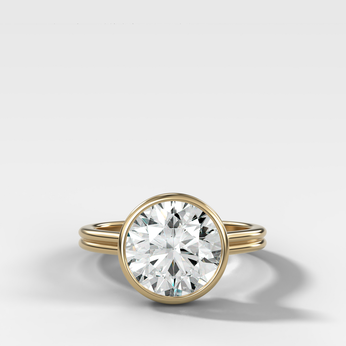 Double Row Penumbra Bezel Engagement Ring With Round Cut Diamond