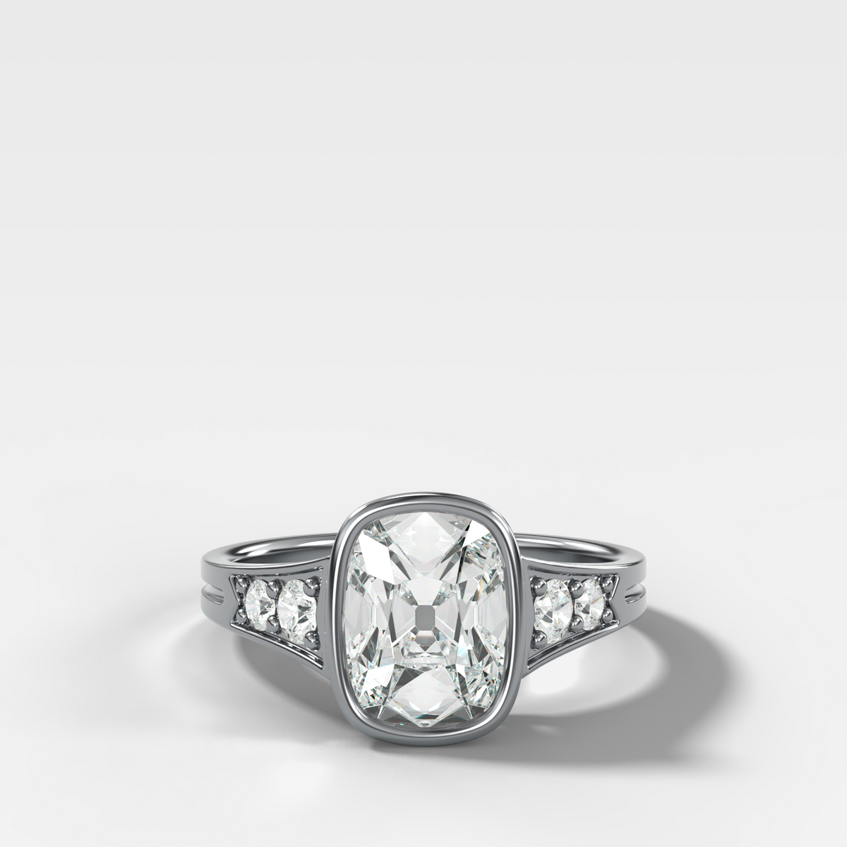 Elongated Old Mine Bezel Engagement Ring with a Tapered Pavé Band