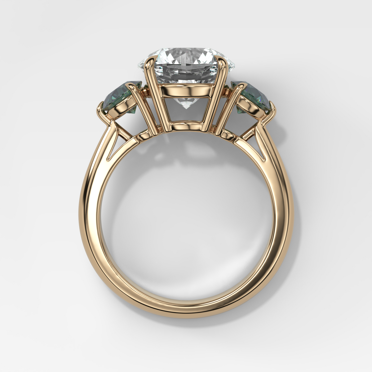 Martini Three Stone Engagement Ring With Round Cut Diamond and Green Sapphires