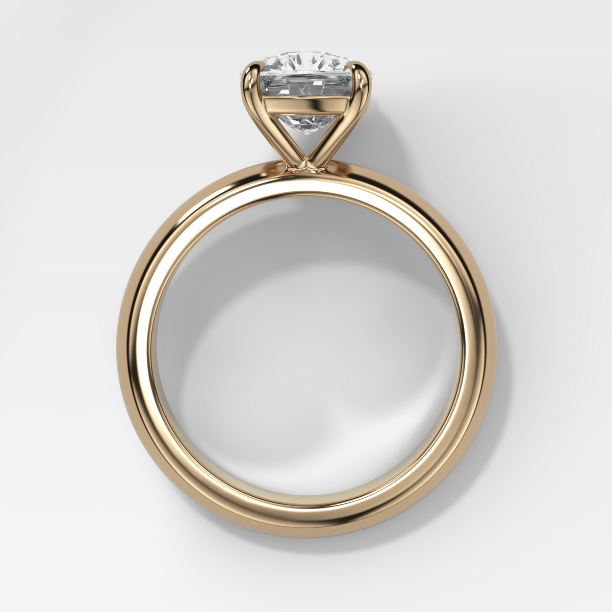 Domed Solitaire Engagement Ring with an Elongated Cushion Cut Diamond