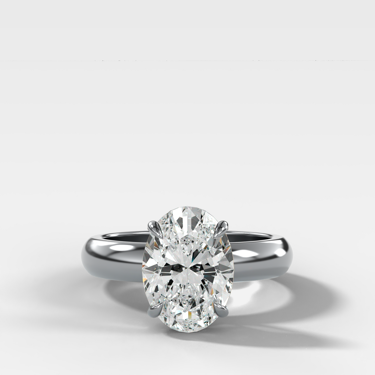 Anillo de compromiso con solitario de medio bisel y doble hilera con diamante de talla esmeralda
