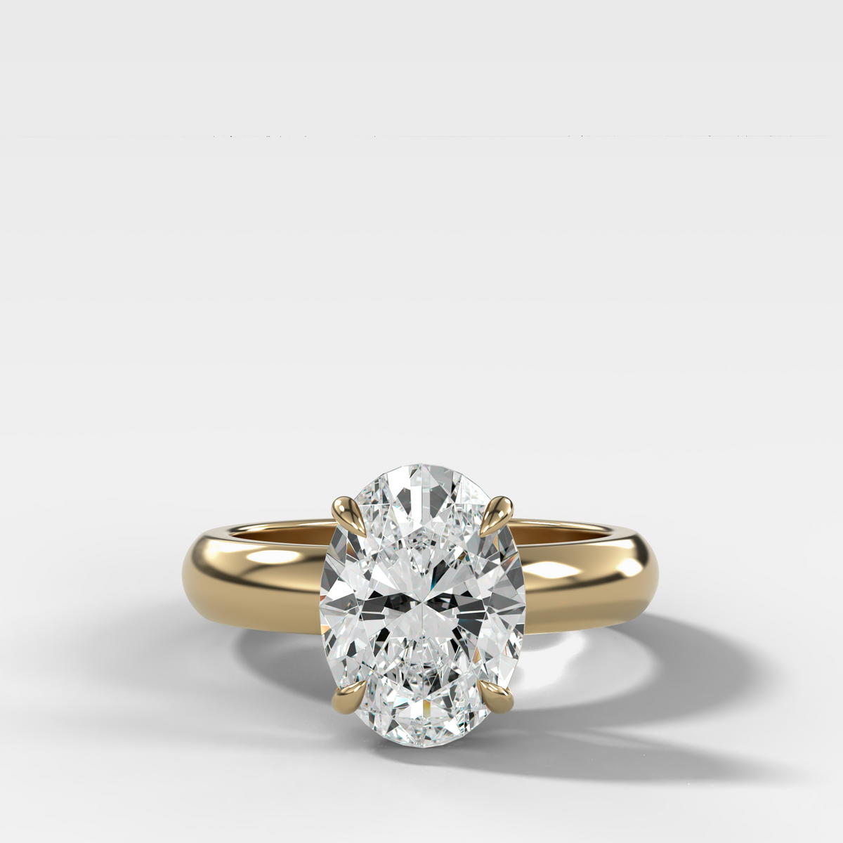 Anillo de compromiso con solitario de medio bisel y doble hilera con diamante de talla esmeralda