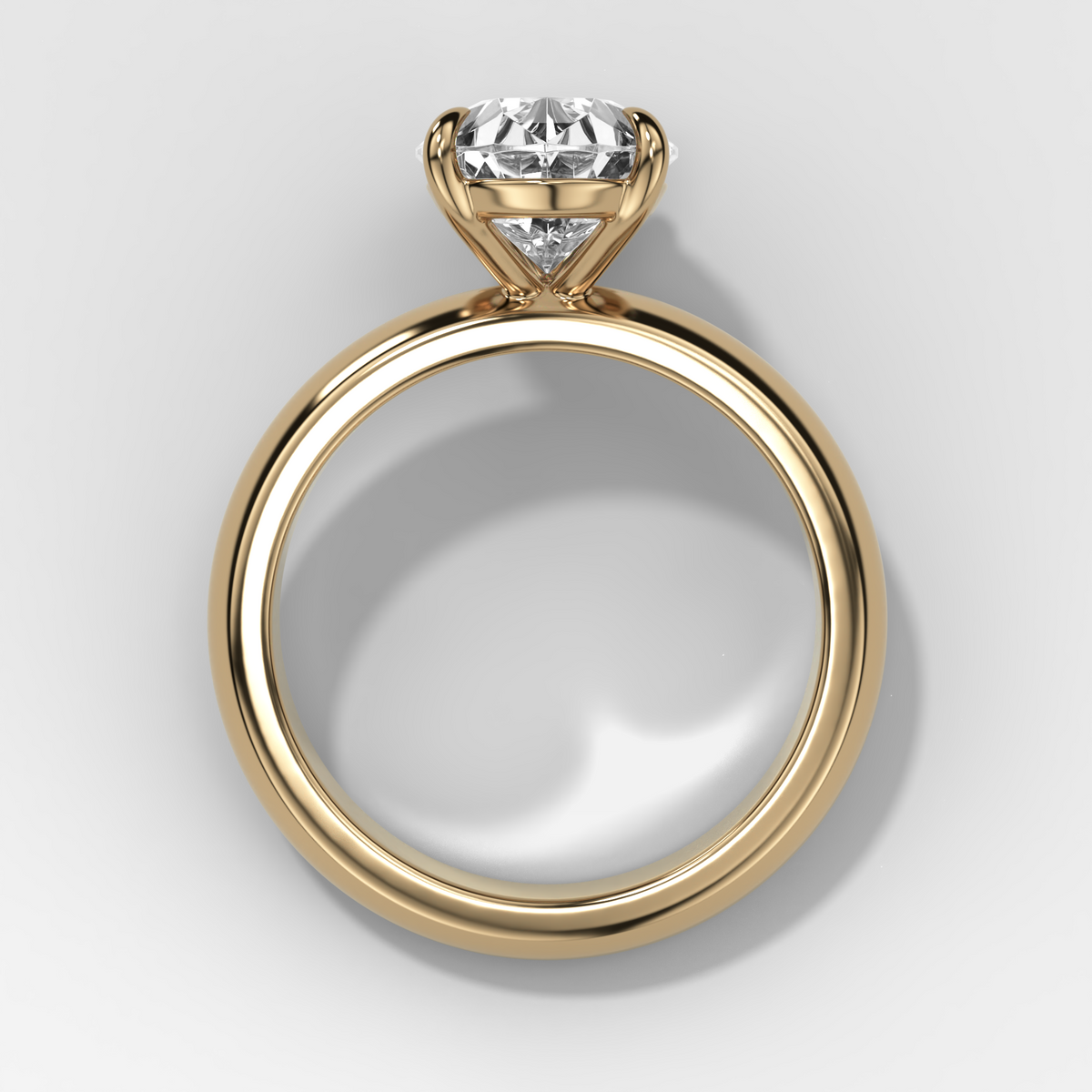 Domed Solitaire Engagement Ring with a Pear Cut Diamond