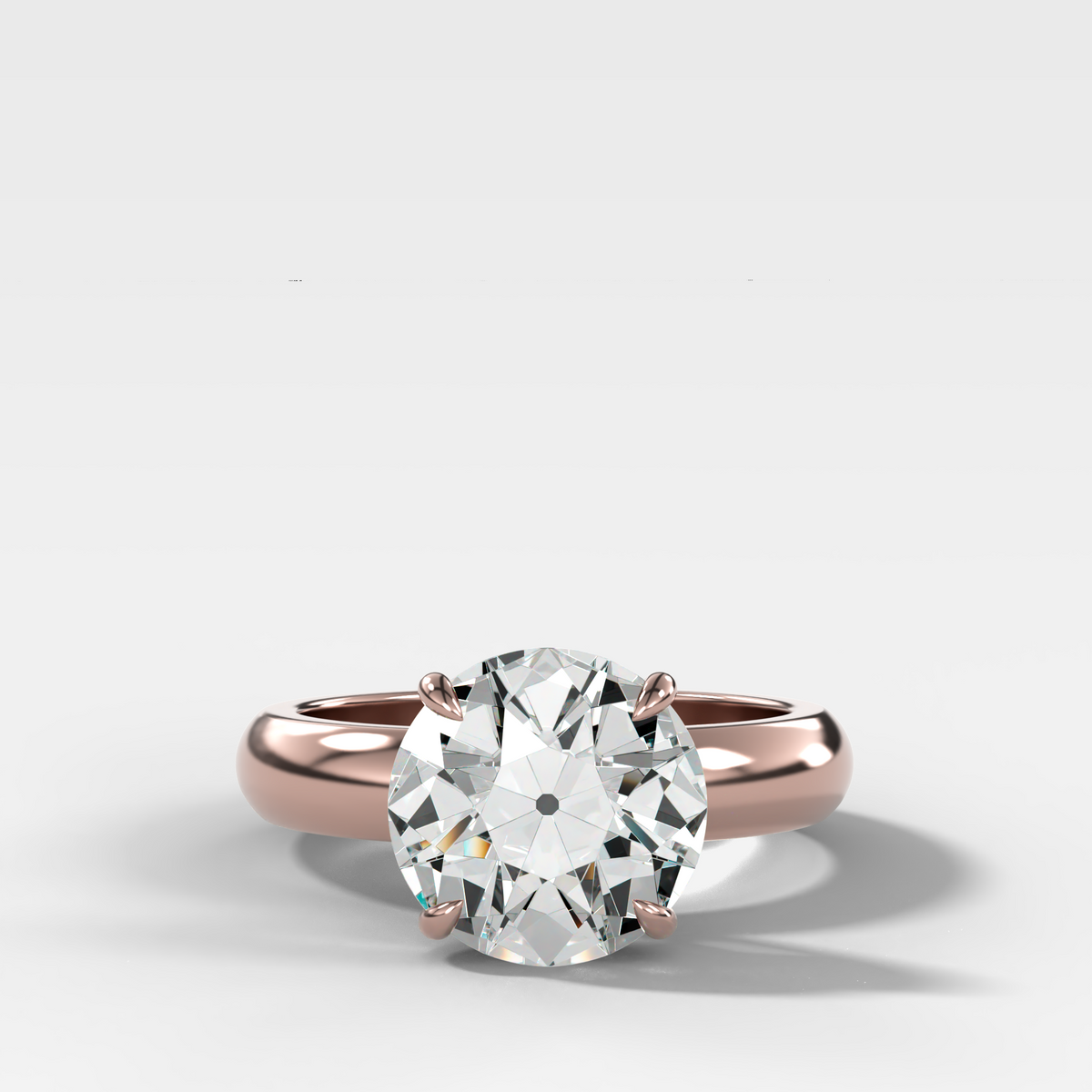 Anillo de compromiso con solitario de medio bisel y doble hilera con diamante de talla esmeralda
