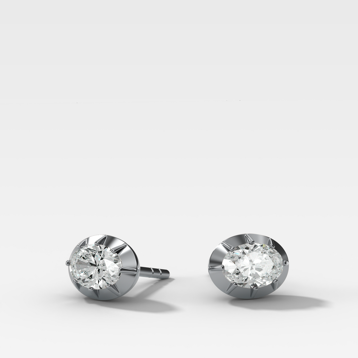 Button Back Studs with East West Oval Cut Diamond