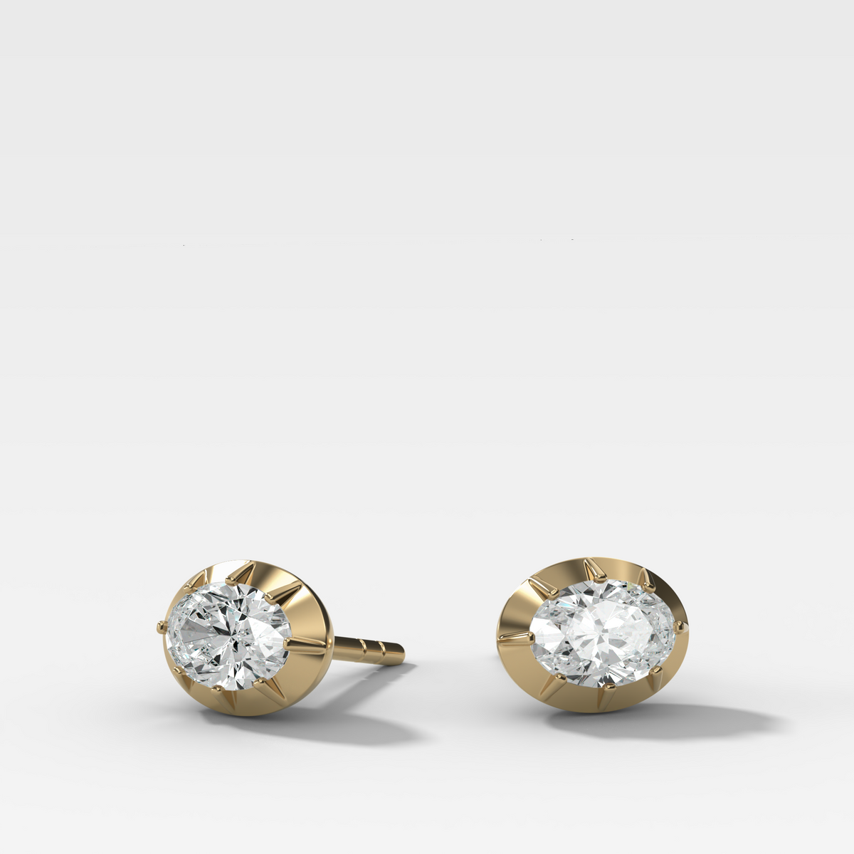 Button Back Studs with East West Oval Cut Diamond