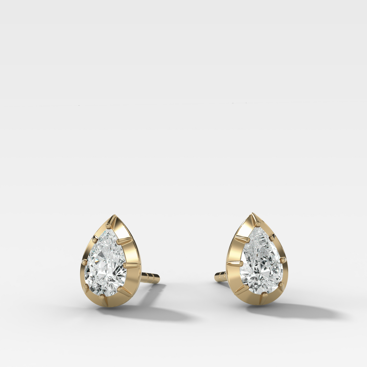 Button Back Studs with Pear Cut Diamond