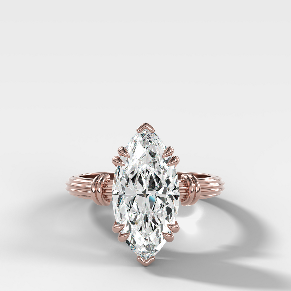 Ridged Band Knot Engagement Ring with Marquise Cut Diamond