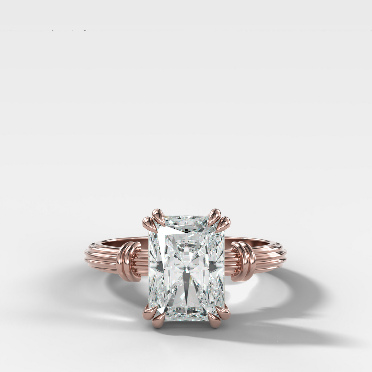 Ridged Band Knot Engagement Ring with Elongated Radiant Cut Diamond