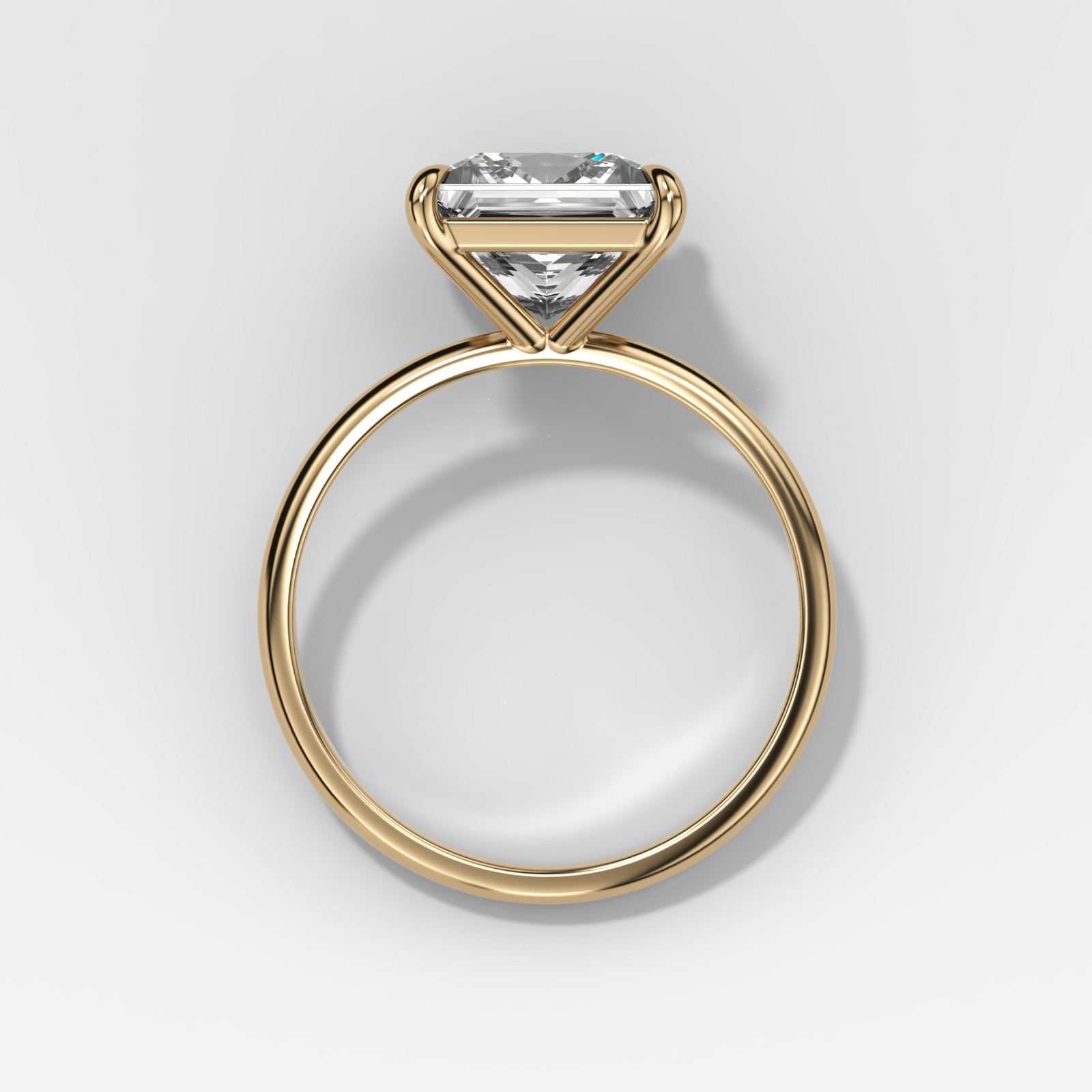 Solitario fino + simple con talla princesa de Good Stone en oro amarillo