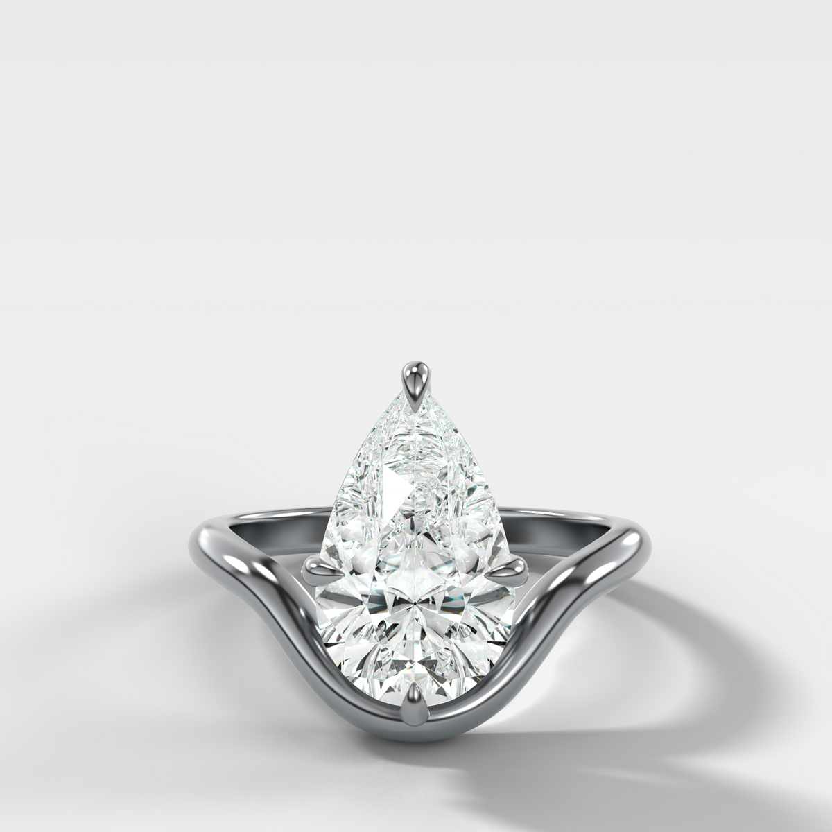 Contoured Compass Set Engagement Ring with Pear Cut Diamond – White Gold / Platinum