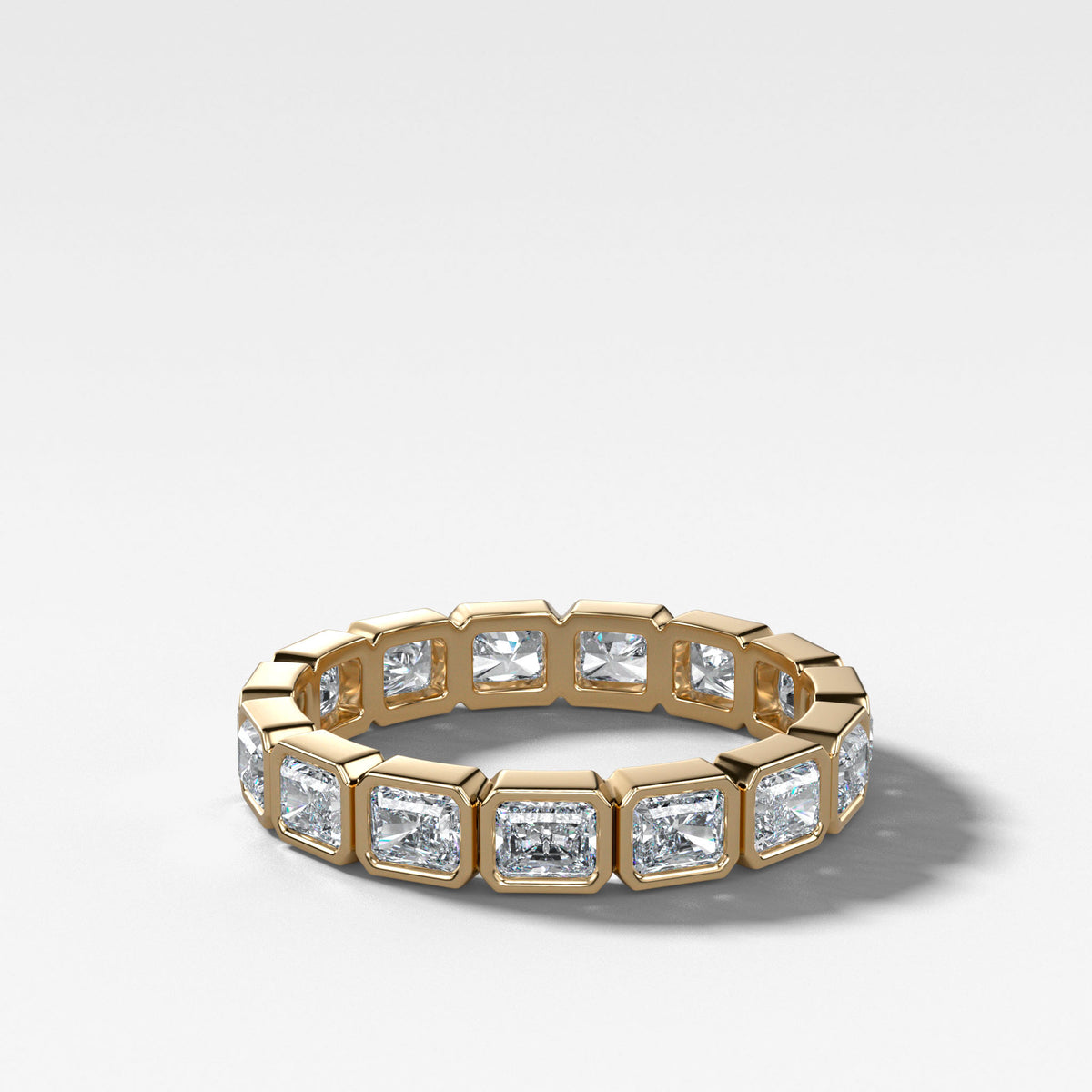 Baby Bezel Set Eternity Band With East West Radiant Cuts