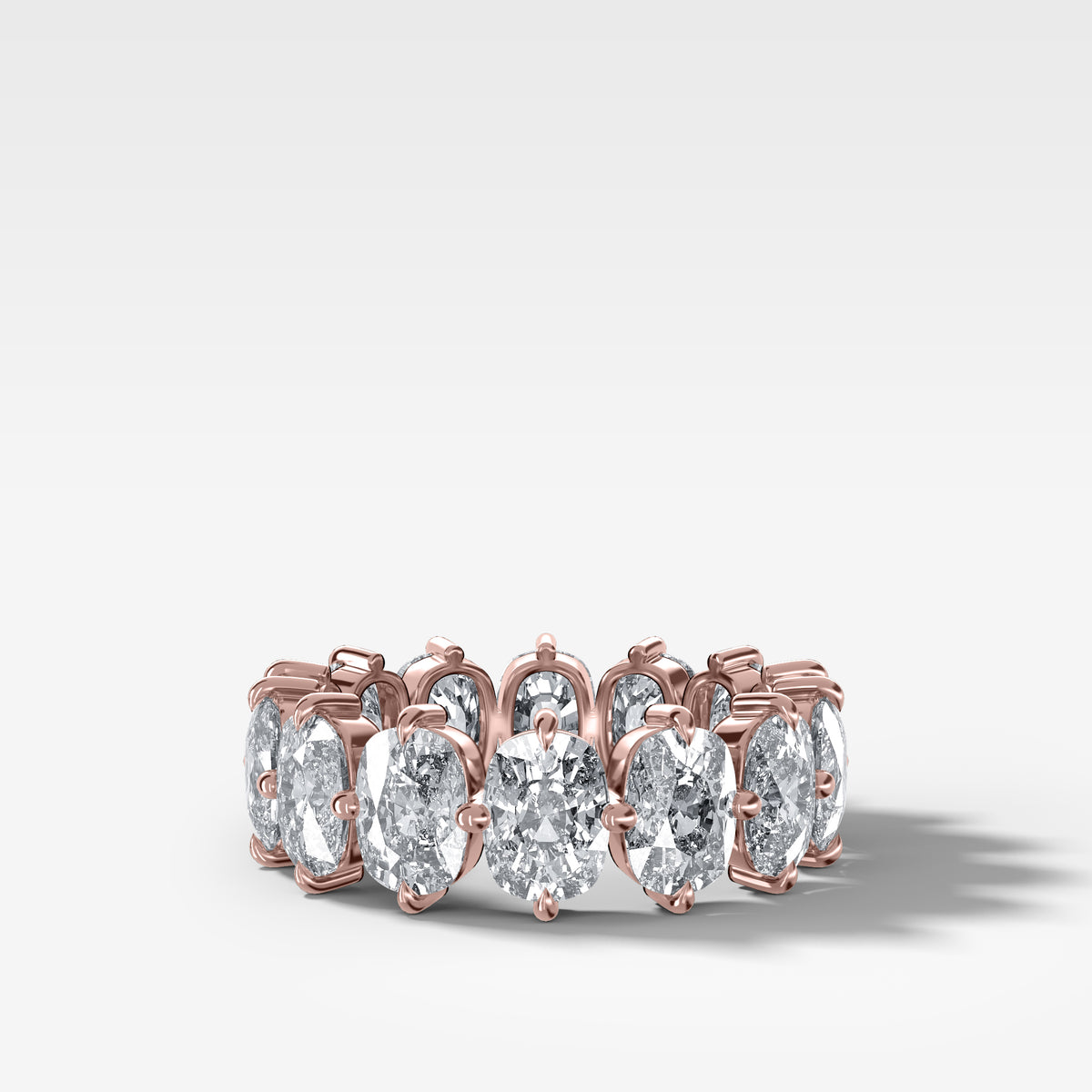 Compass-Set Eternity Band with Elongated Cushion Cut Diamonds
