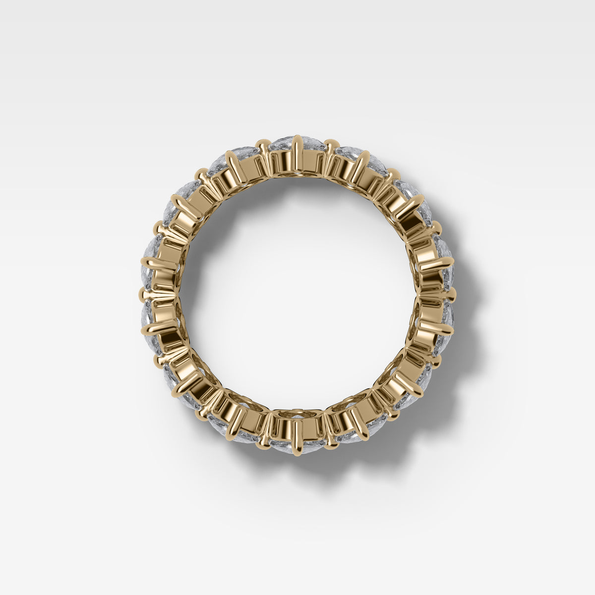 Compass-Set Eternity Band with Elongated Cushion Cut Diamonds