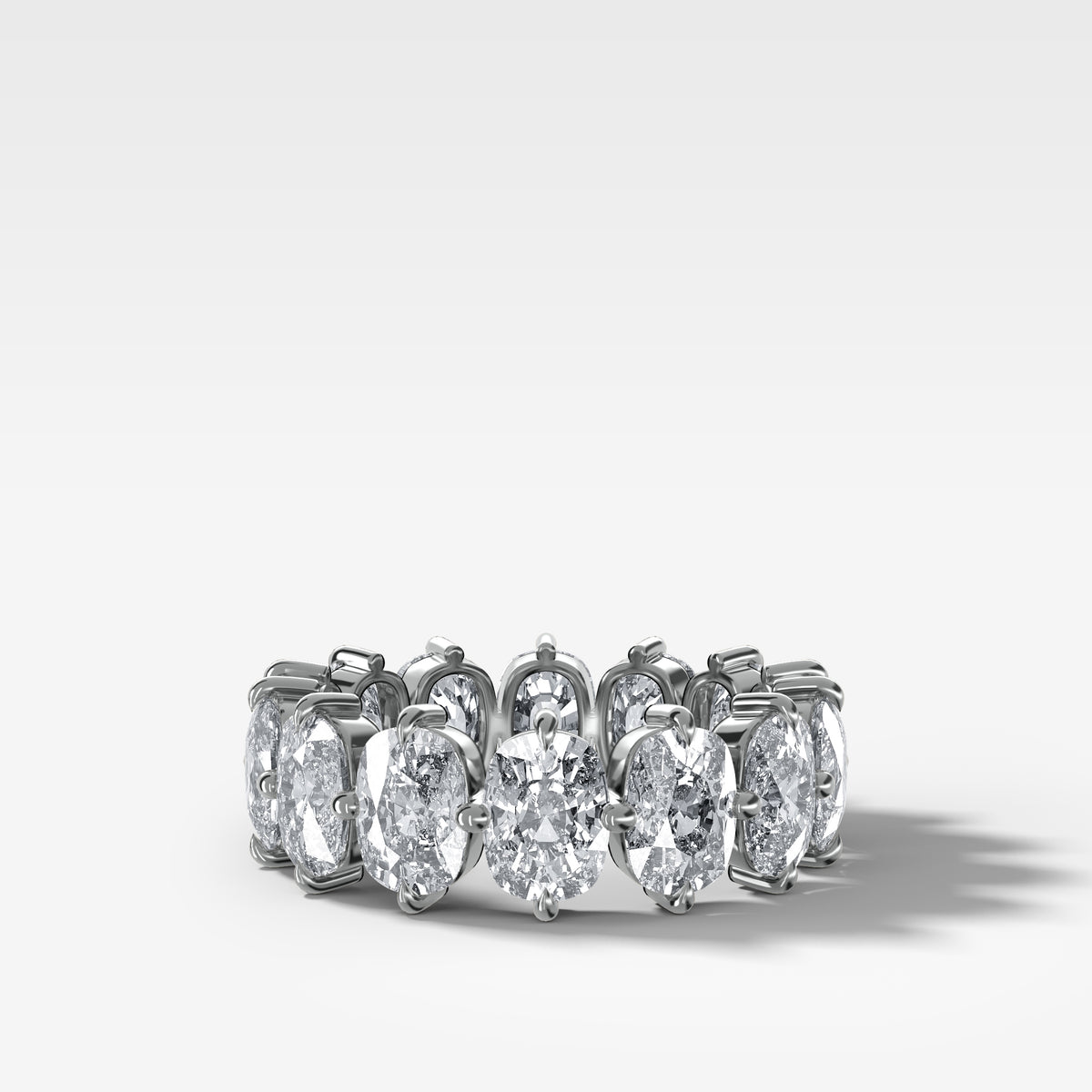 Compass-Set Eternity Band with Elongated Cushion Cut Diamonds