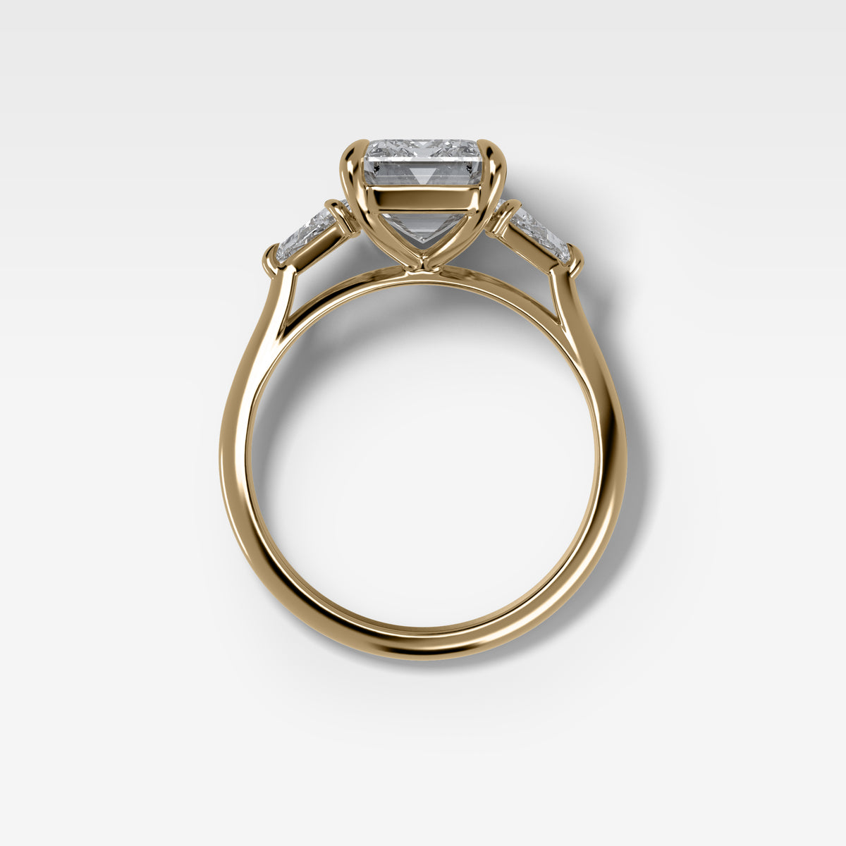 Three Stone Engagement Ring With Kite Side Stones and Emerald Cut Diamond