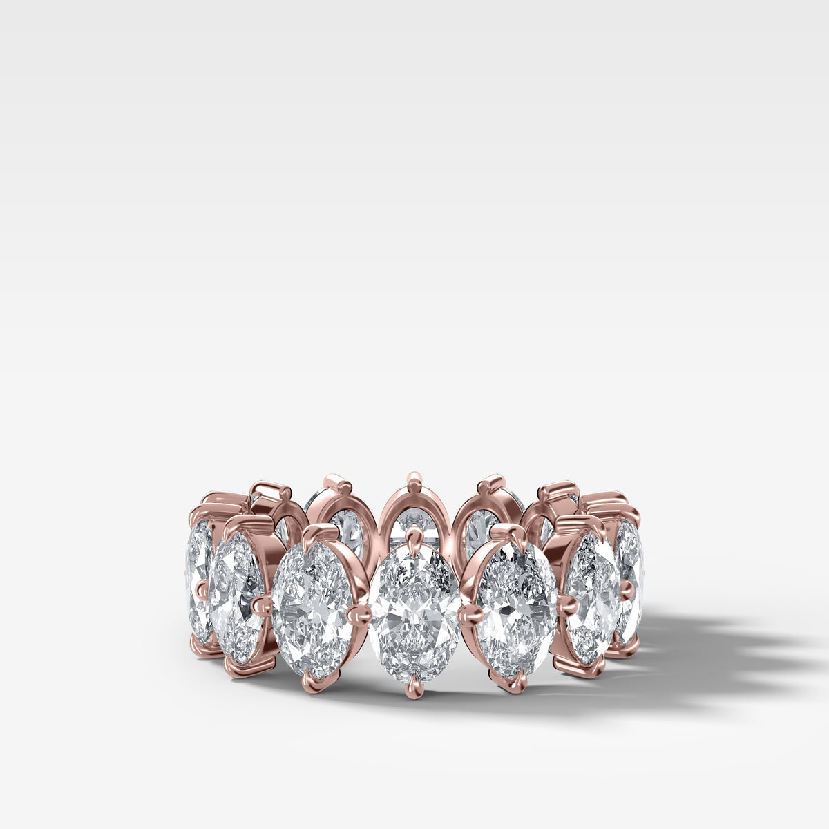 Compass-Set Eternity Band with Oval Cut Diamonds