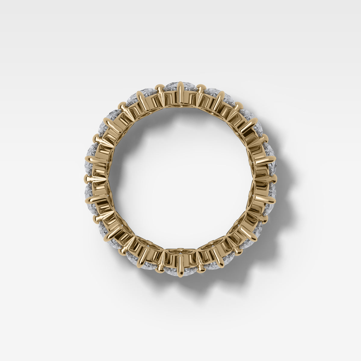 Compass-Set Eternity Band with Oval Cut Diamonds