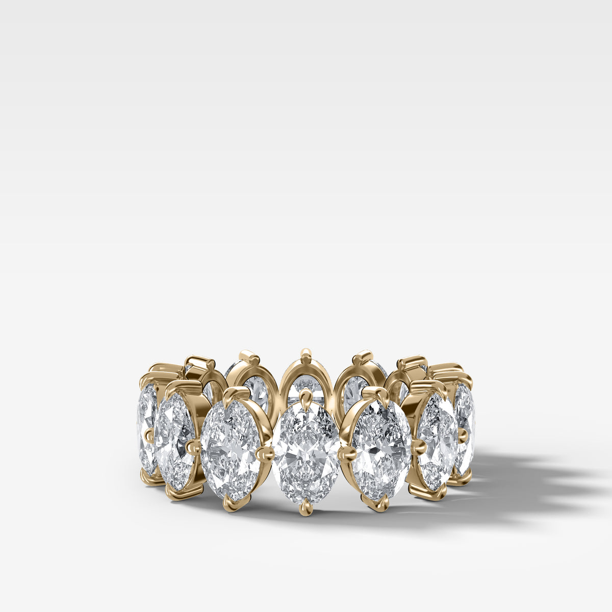Compass-Set Eternity Band with Oval Cut Diamonds