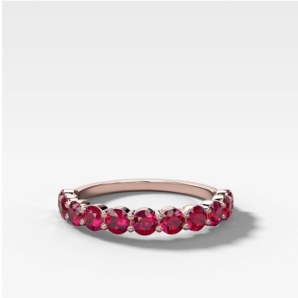 Shared Prong Wedding Band With Red Ruby Rounds