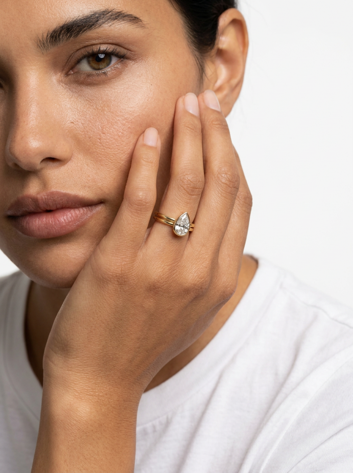 Double Row Penumbra Bezel Engagement Ring With Pear Cut Diamond