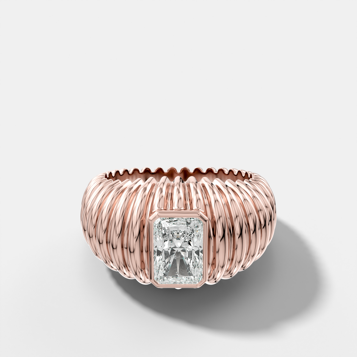 Accordion Cigar Band with an Elongated Radiant Cut Diamond