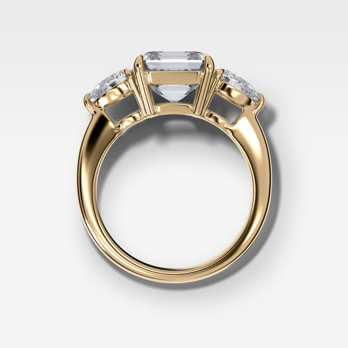 Three Stone Engagement Ring With Pear Side Stones and Asscher Cut Diamond