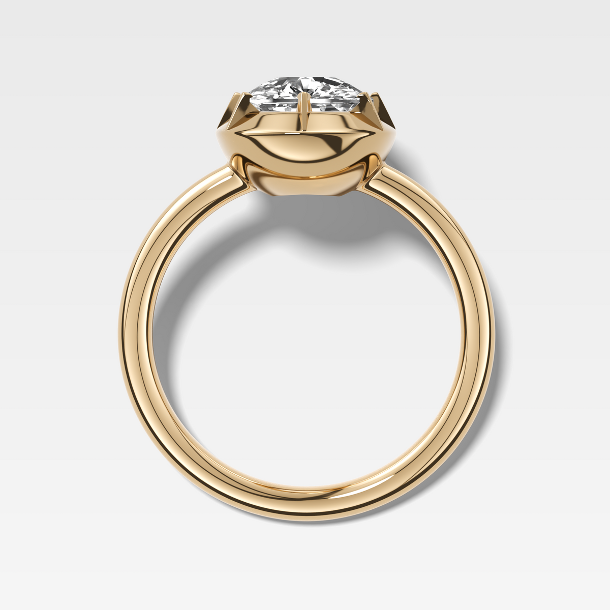 Button Back Solitaire Engagement Ring With an Elongated Cushion Cut Diamond