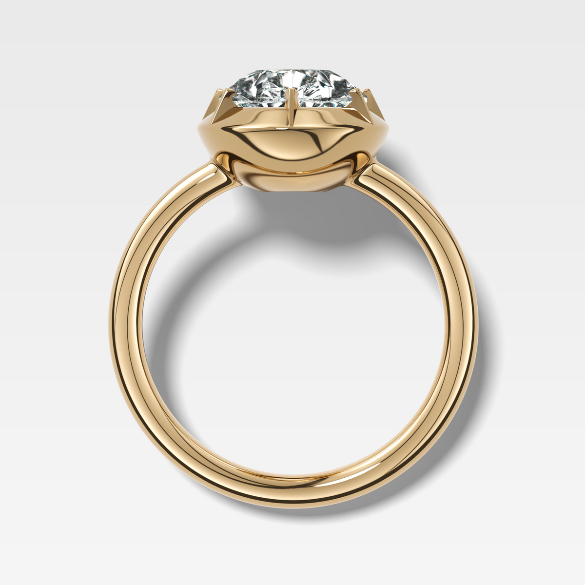Button Back Solitaire Engagement Ring With a Pear Cut Diamond