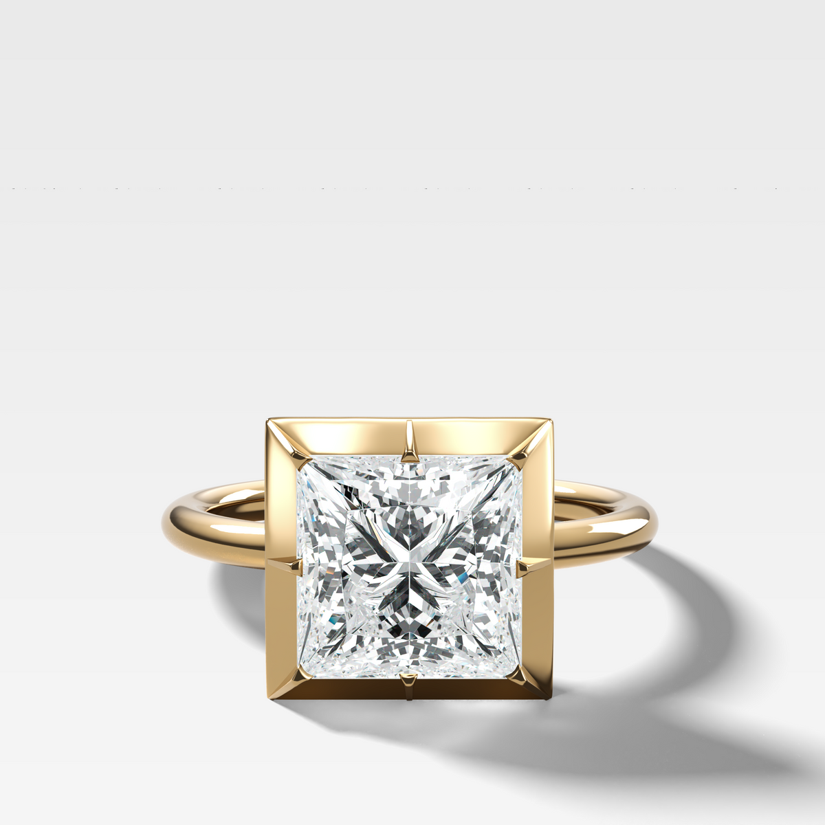 Button Back Solitaire Engagement Ring With a Princess Cut Diamond