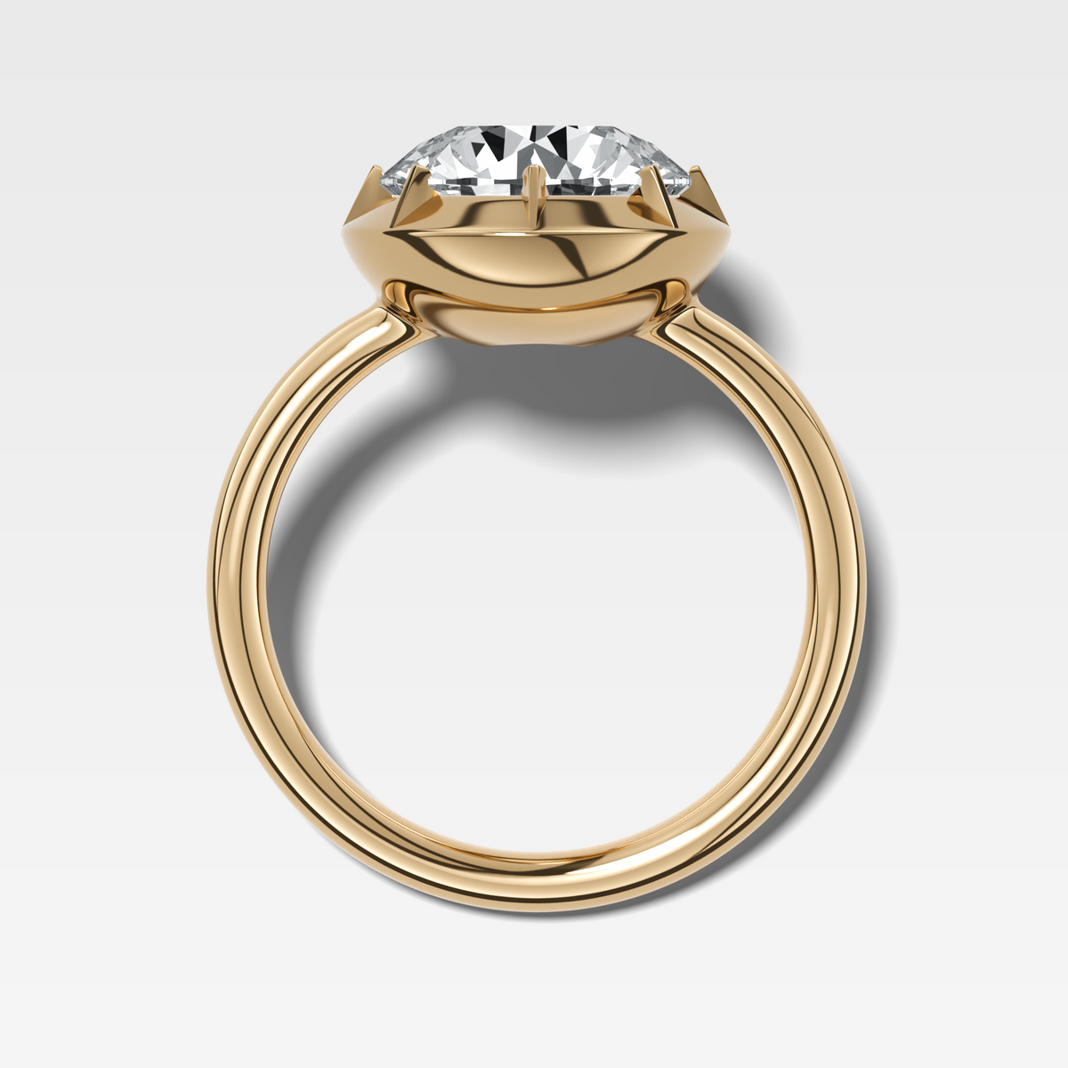 Button Back Solitaire Engagement Ring With a Round Cut Diamond