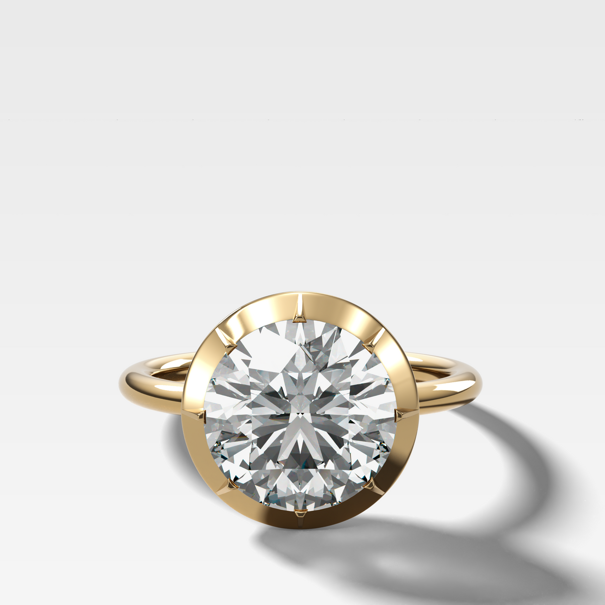 Button Back Solitaire Engagement Ring With a Round Cut Diamond