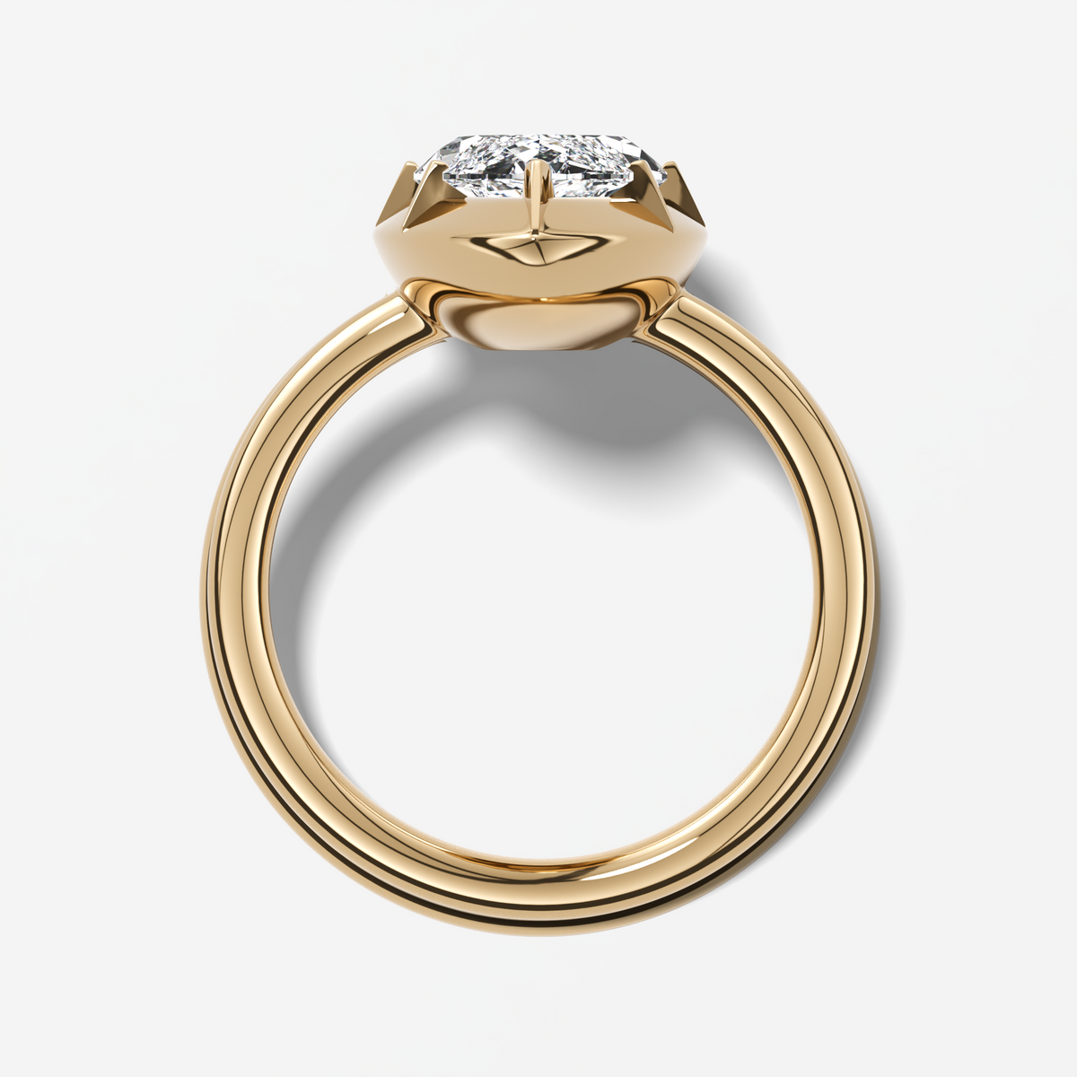 Button Back Solitaire Engagement Ring With a Marquise Cut Diamond