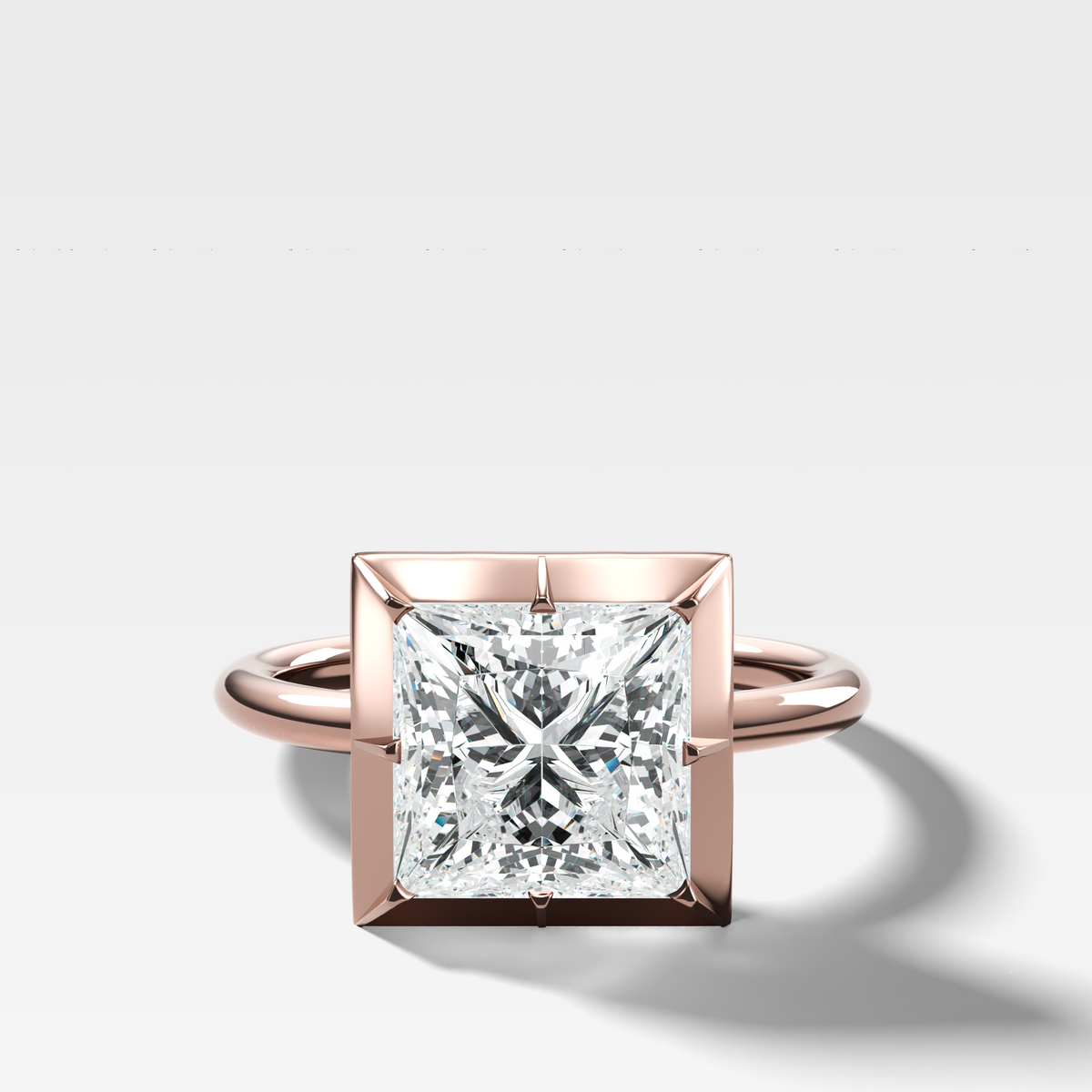 Button Back Solitaire Engagement Ring With a Princess Cut Diamond