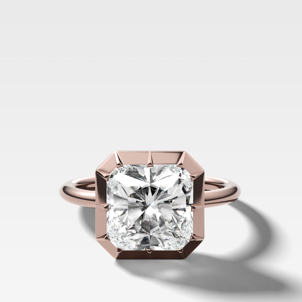Button Back Solitaire Engagement Ring With a Square Radiant Cut Diamond