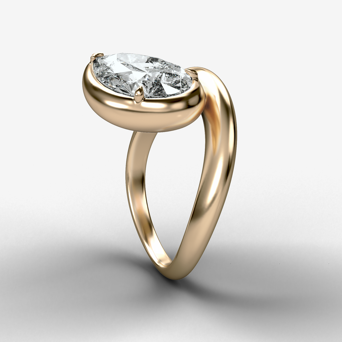 Contoured Club Engagement Ring with a Pear Cut Diamond