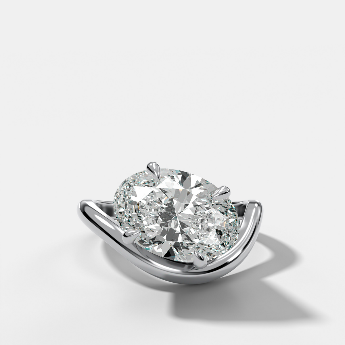 Contoured Engagement Ring with an Oval Cut Diamond