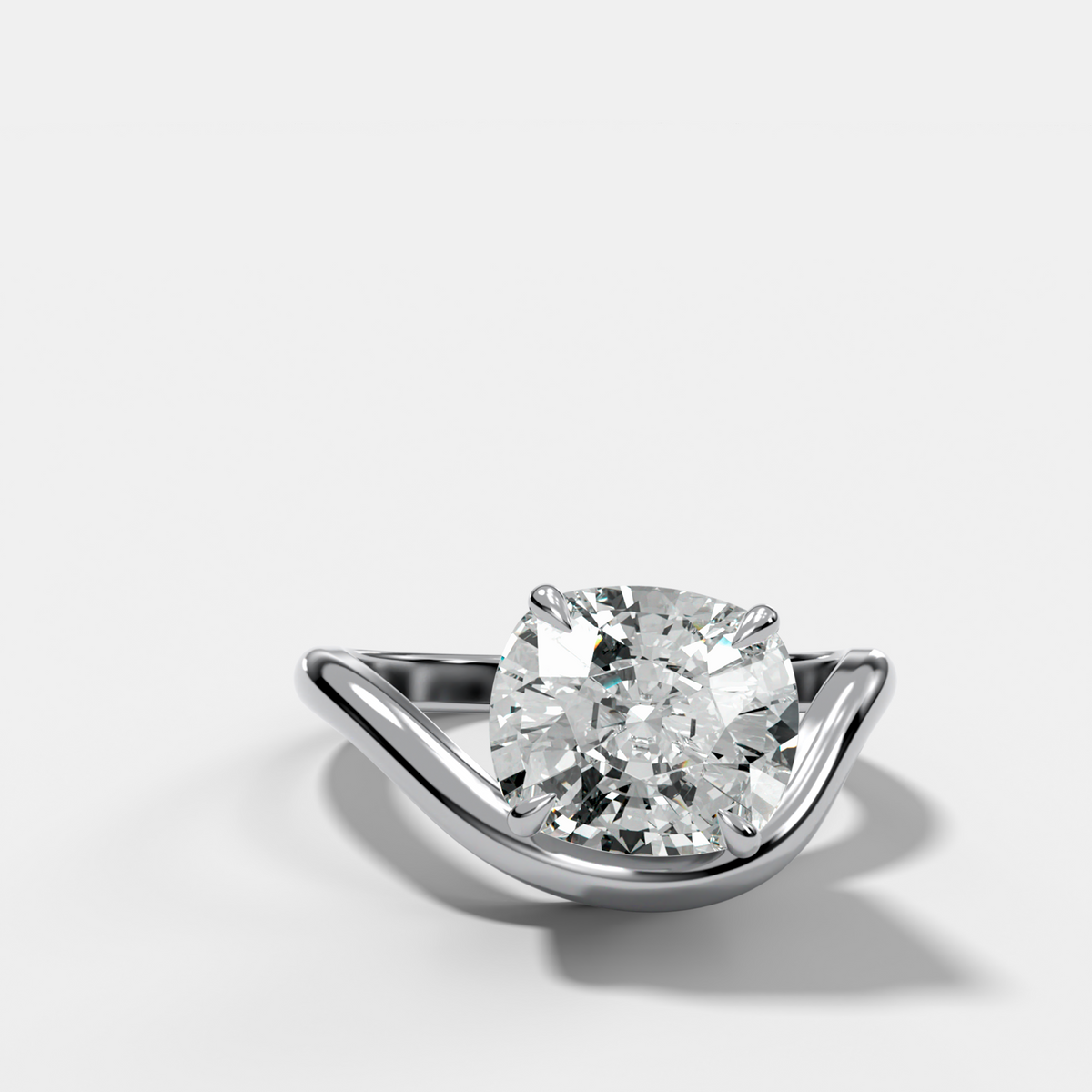 Contoured Engagement Ring with an Elongated Cushion Cut Diamond