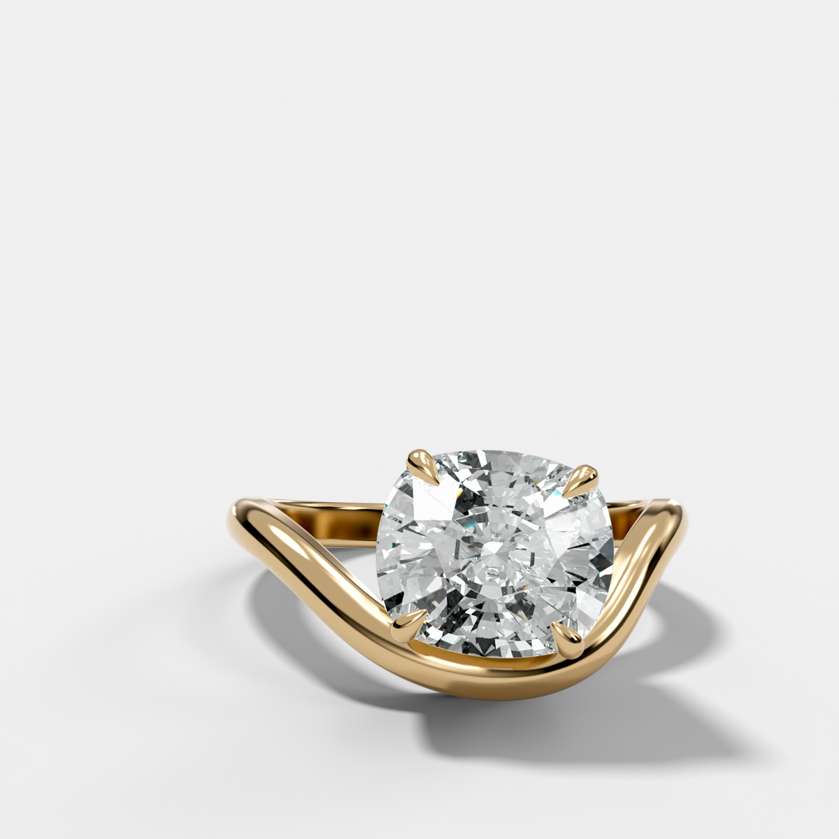 Contoured Engagement Ring with an Elongated Cushion Cut Diamond