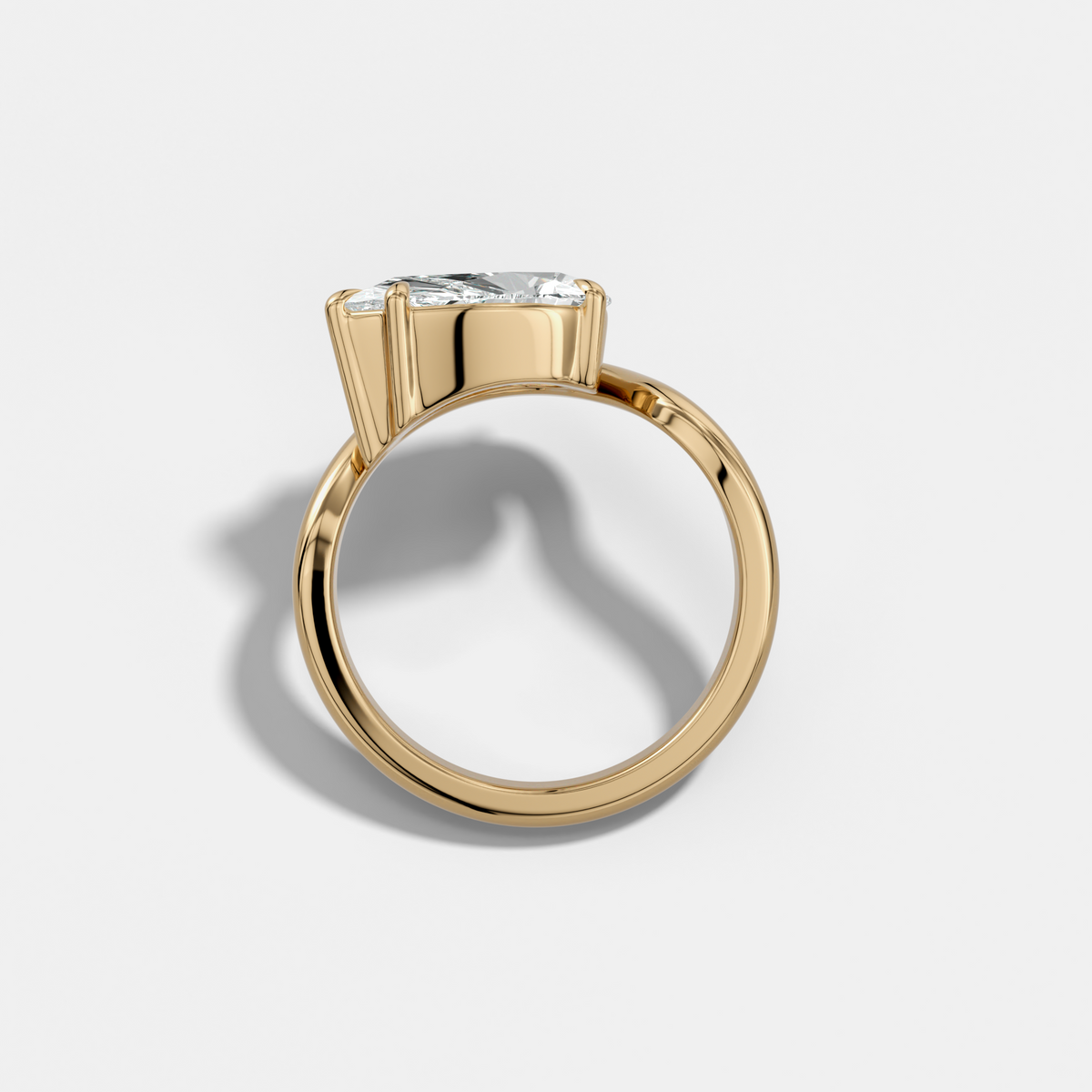 Contoured Engagement Ring with a Pear Cut Diamond