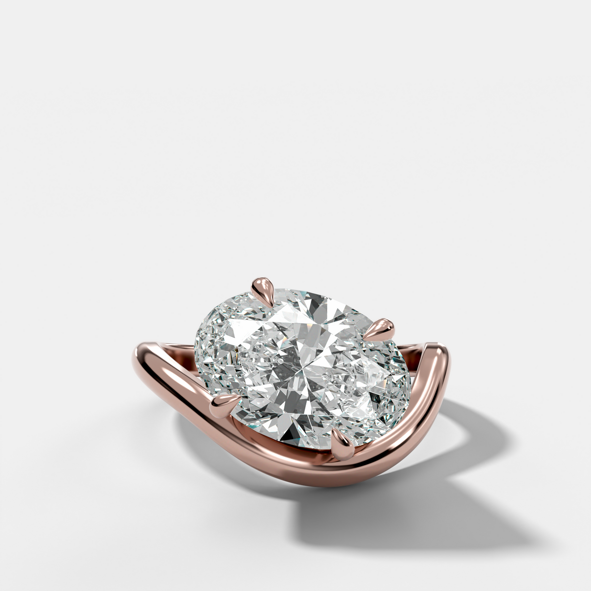 Contoured Engagement Ring with an Oval Cut Diamond